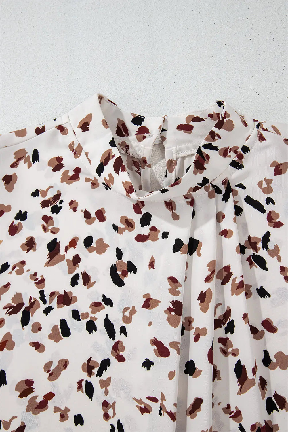 White Leopard Print Lantern Sleeve Mock Neck Pleated Blouse Beagle Boutique Fashion Outlet