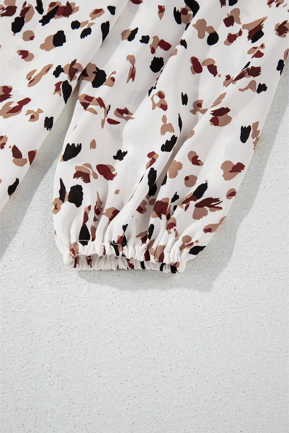 White Leopard Print Lantern Sleeve Mock Neck Pleated Blouse Beagle Boutique Fashion Outlet