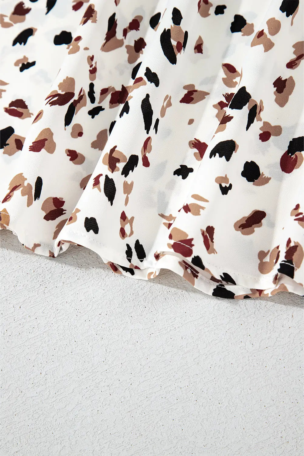 White Leopard Print Lantern Sleeve Mock Neck Pleated Blouse Beagle Boutique Fashion Outlet