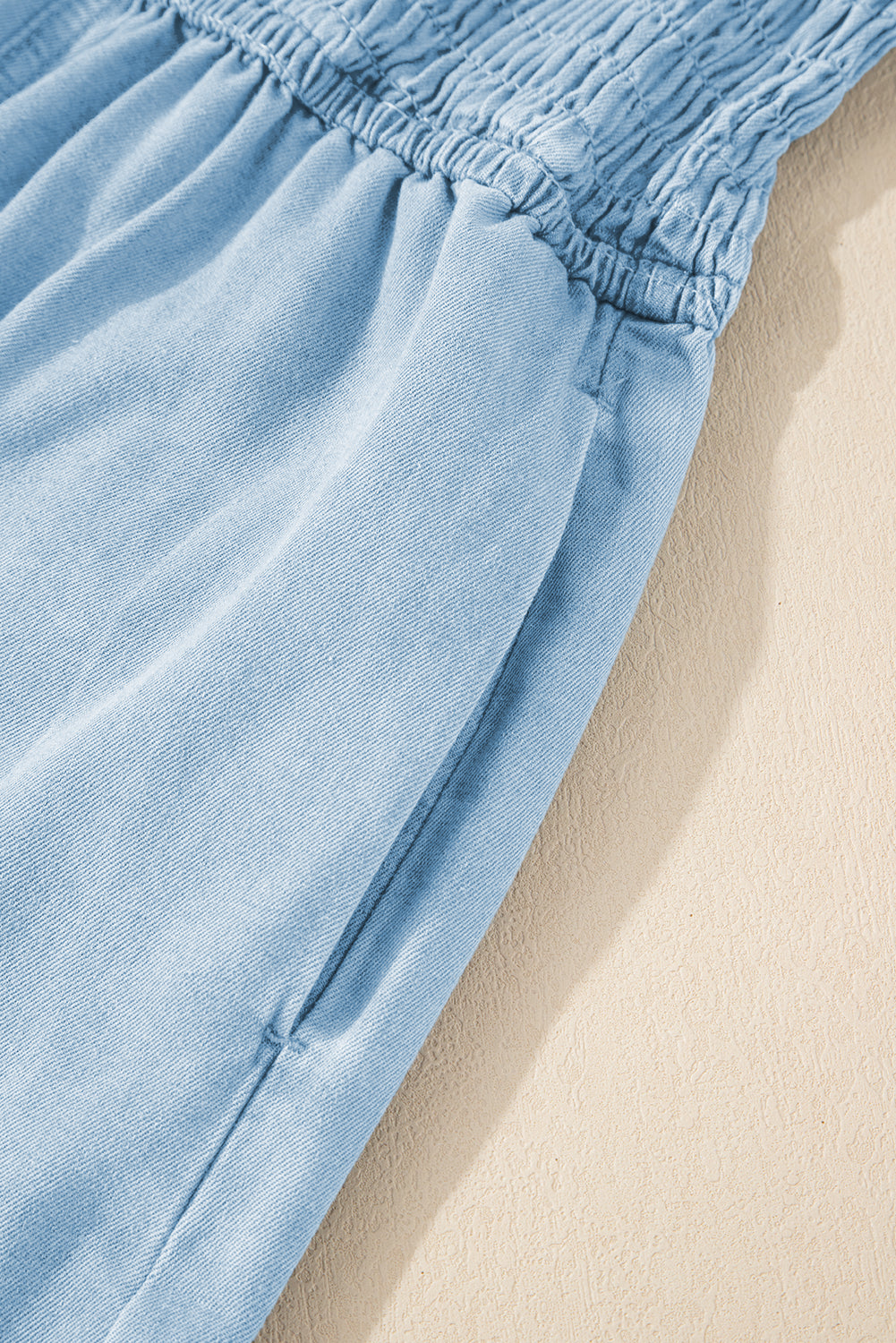 Beau Blue Spaghetti Strap Smocked Denim Romper - eAura