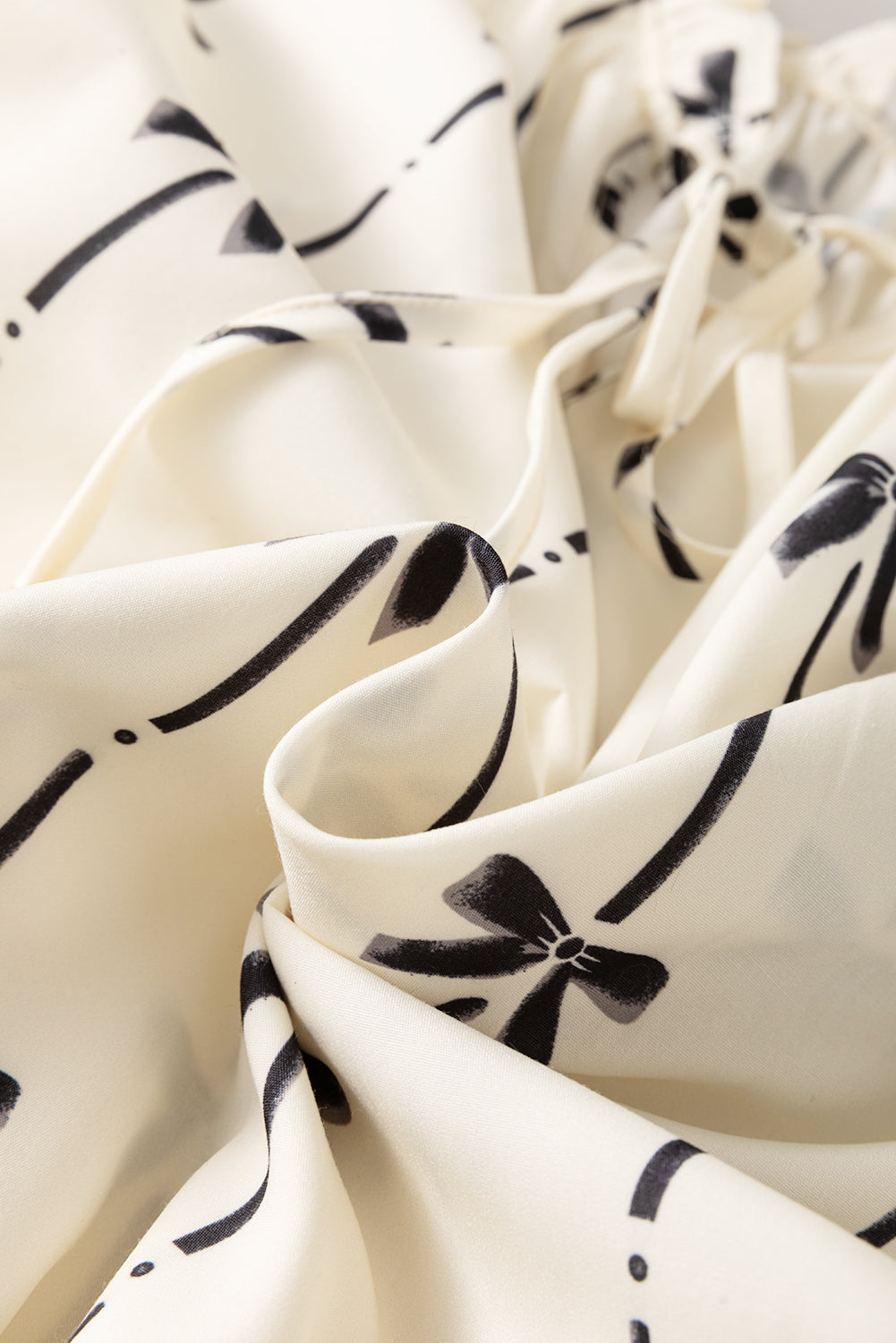 Apricot Bow Printed Ruffled Bubble Sleeve Lace-up Notched Neck Plus Size Blouse - eAura