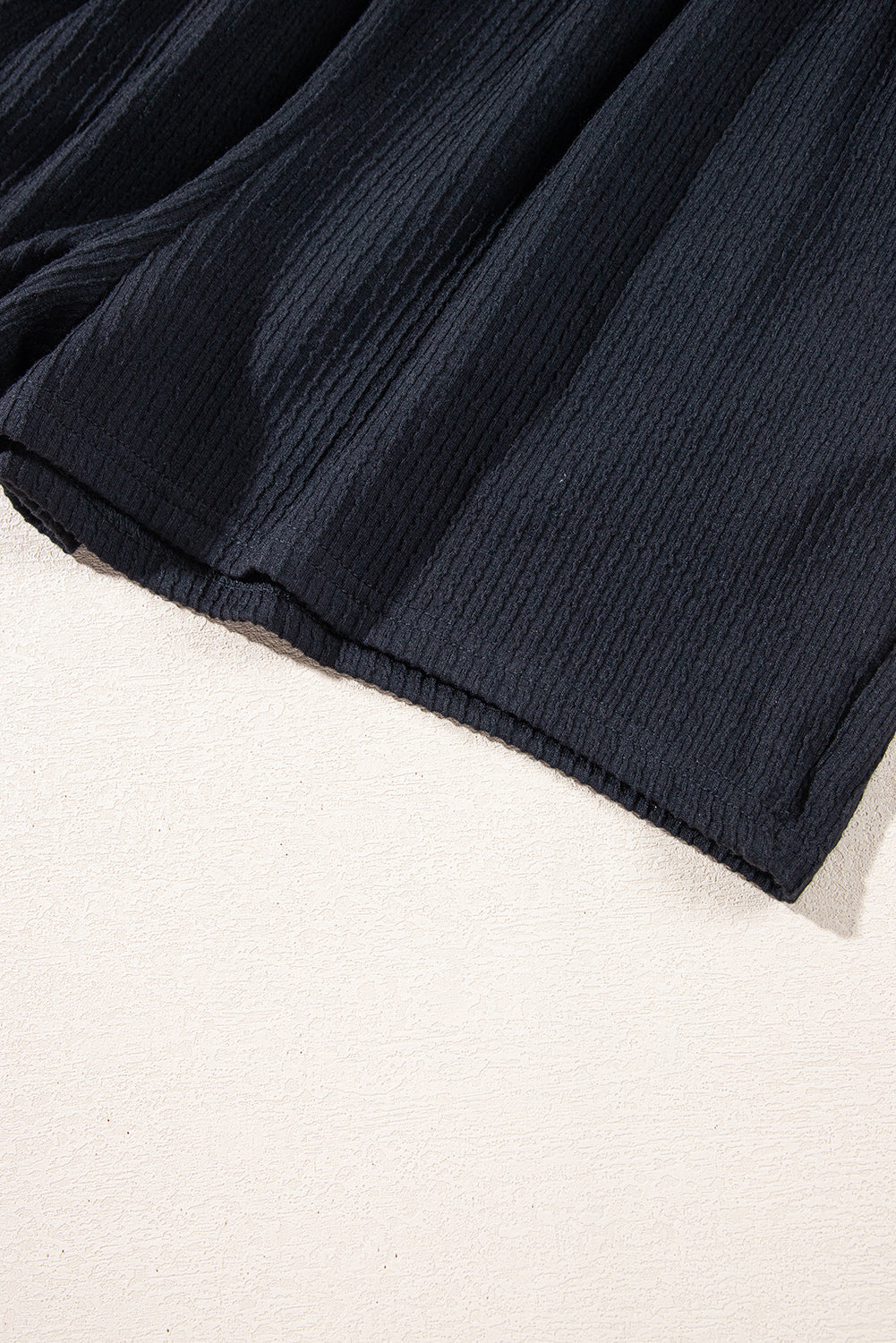Black Smocked Bust Textured Knit Sleeveless Romper eAura