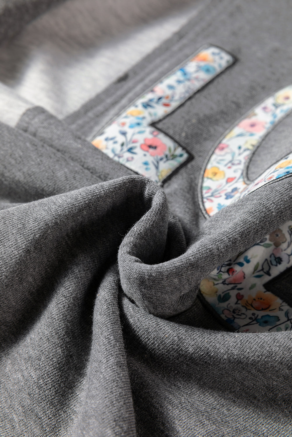 LOVE Graphic Exposed Seam Patchwork Uneven Hem Chic Sweatshirt - eAura