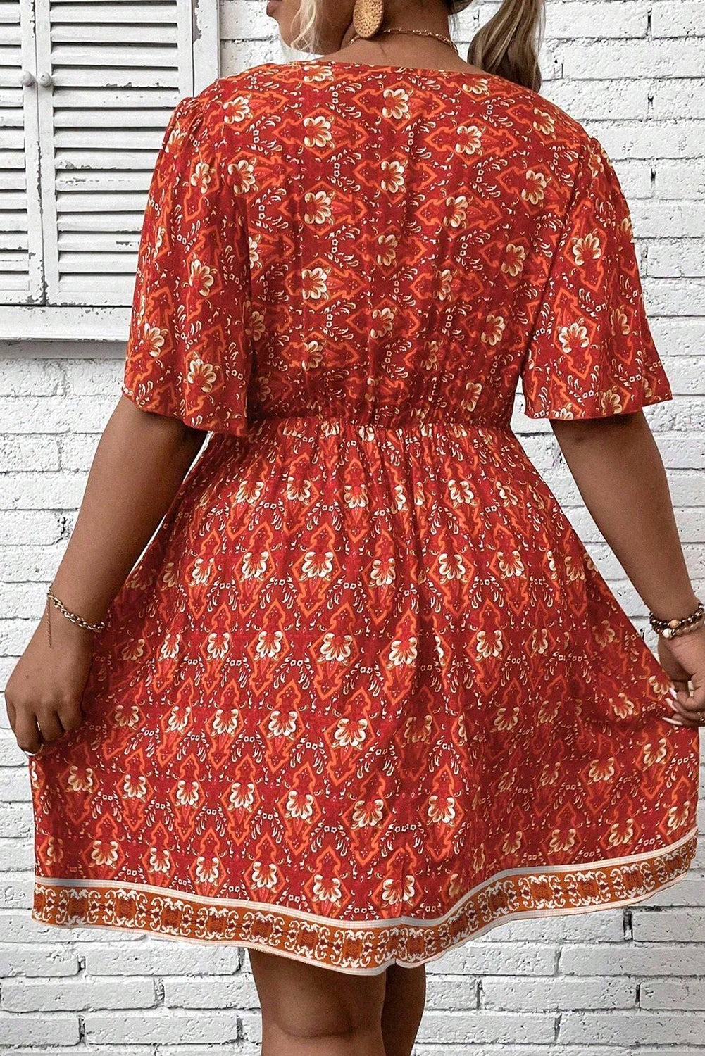 Orange Plus Size Printed Surplice Neck Empire Waist Flowy Mini Dress BB Fashion Outlet