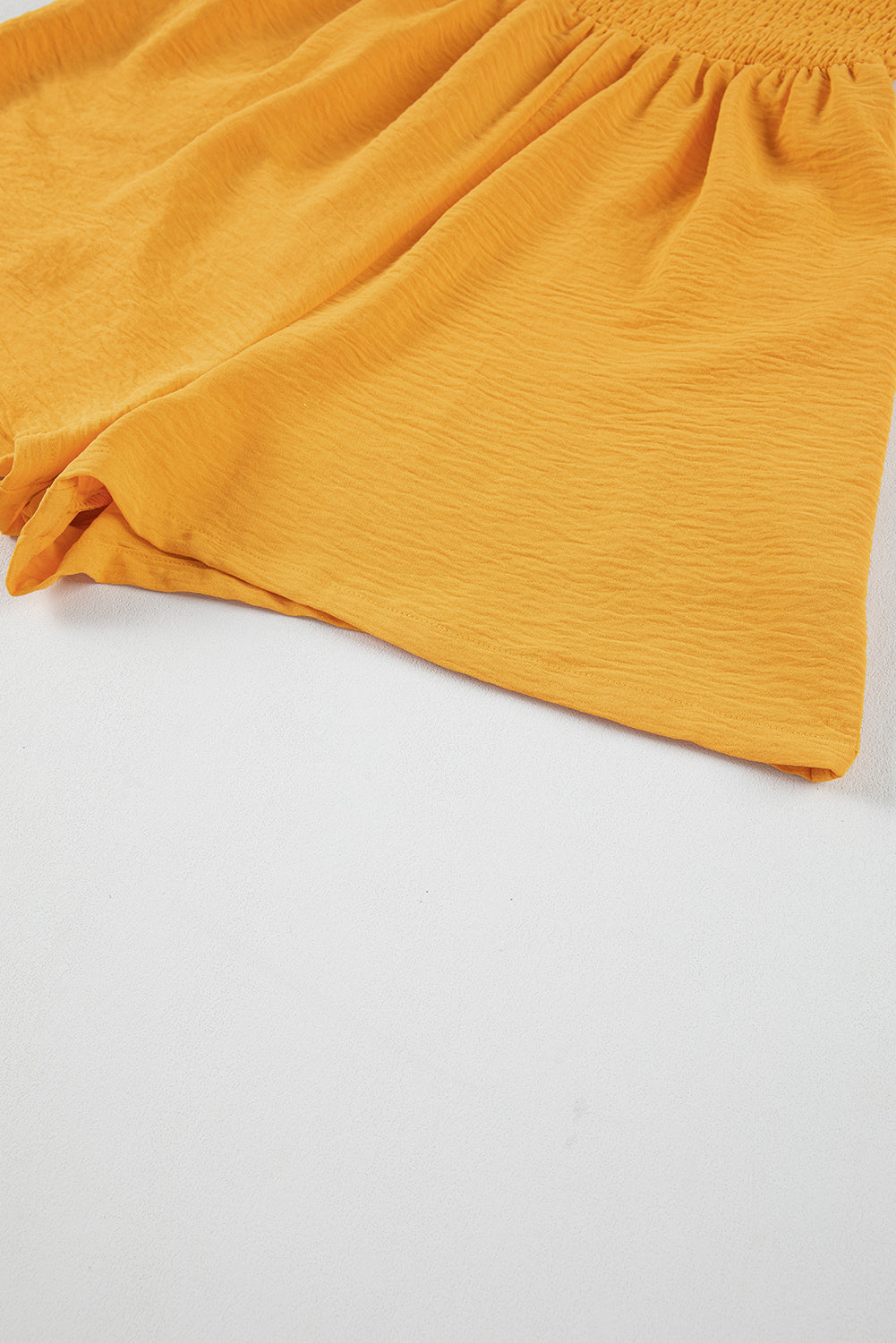 Pocketed Smocked Sleeveless Romper