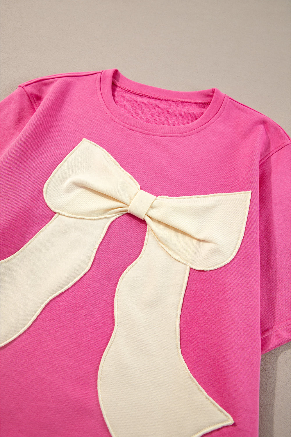 Strawberry Pink Contrasting Colour Ribbon Bow Front Patch Loose Tee with Slits eAura